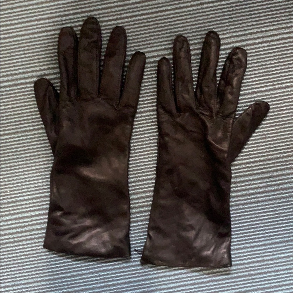 Genuine leather. 100% Cashmere Lined